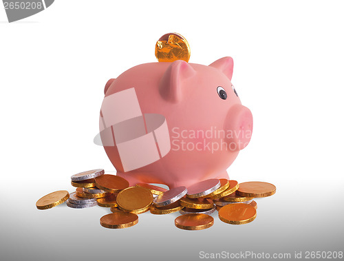 Image of Euro currency, chocolate coins with piggy bank