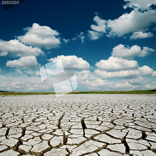 Image of blue dramatic sky with clouds over desert