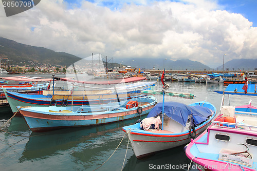 Image of boats stand at the pier in Alanya