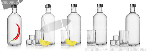 Image of Bottles of vodka and glasses