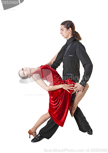 Image of Young couple dancing tango