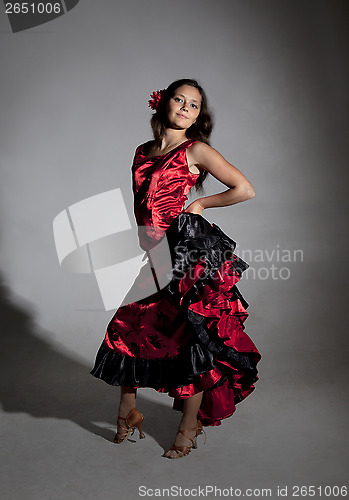 Image of Young woman dancing flamenco