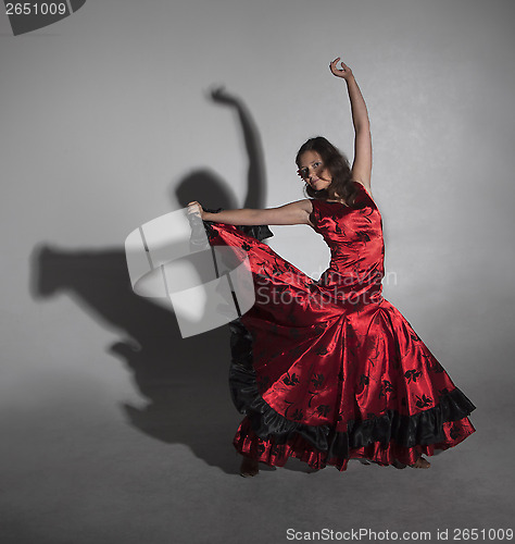 Image of Young woman dancing flamenco