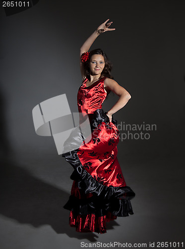 Image of Young woman dancing flamenco