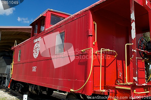 Image of old fashioned red train caboose