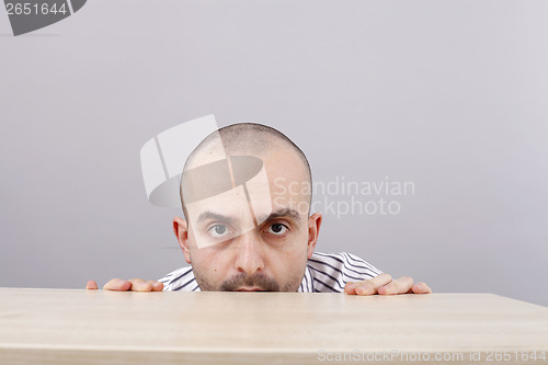 Image of Man at desk