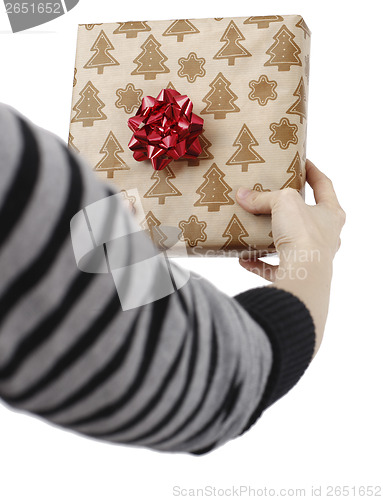 Image of Young woman holding a present