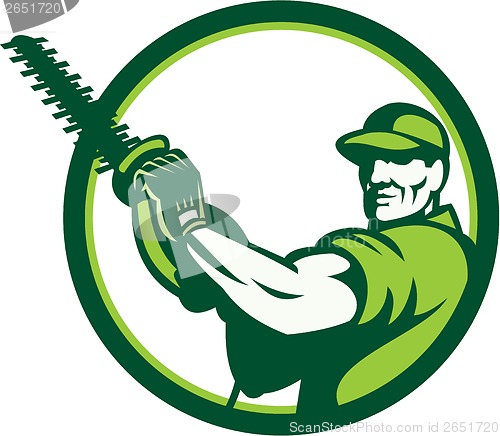 Image of Tree Surgeon Holding Hedge Trimmer Retro