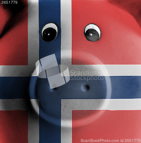 Image of Ceramic piggy bank with painting of national flag 