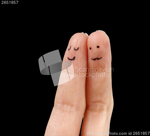 Image of White hand on black