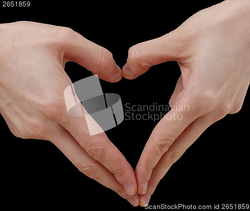 Image of White hand on black