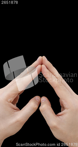 Image of White hand on black