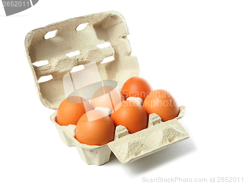 Image of Box with eggs on white