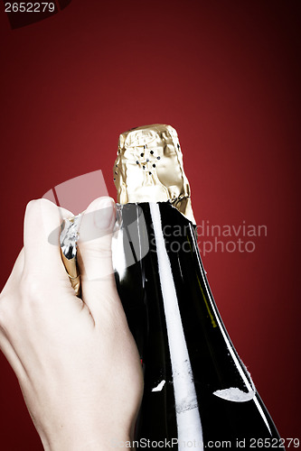 Image of Opening champagne bottle