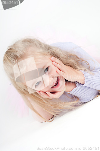 Image of Portrait of happy blond little girl