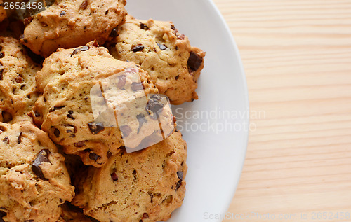 Image of Closeup of fresh chocolate chip and pecan cookies