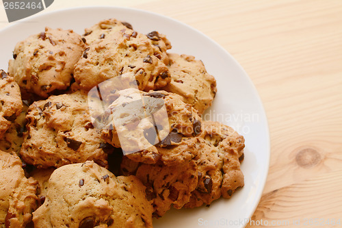 Image of Plate of delicious pecan and chocolate chip cookies