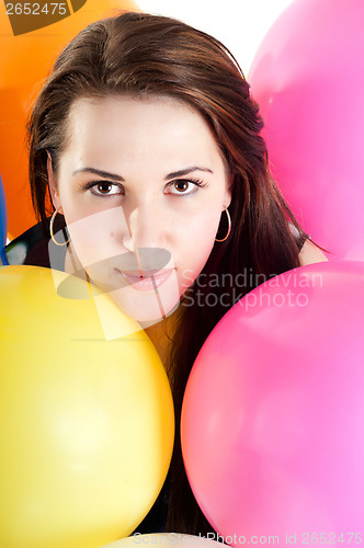 Image of Beautiful female with multicolored air balloons