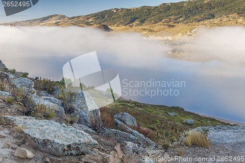 Image of mountain lake in a fog