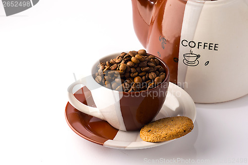 Image of Cup of roasted brown coffee beans