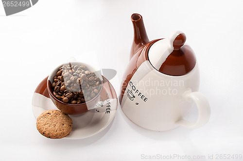 Image of Cup of roasted brown coffee beans