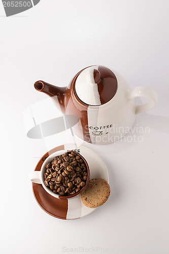 Image of Cup of roasted brown coffee beans