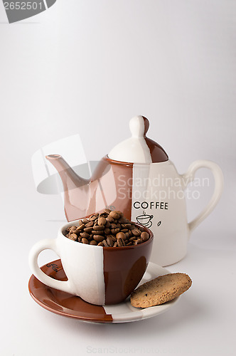 Image of Cup of roasted brown coffee beans