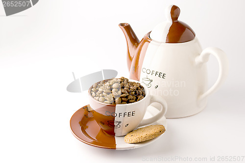 Image of Cup of roasted brown coffee beans
