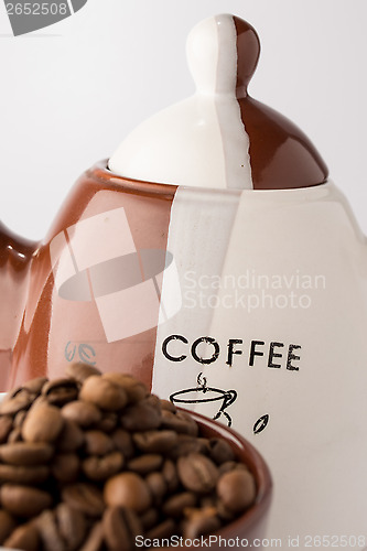 Image of Cup of roasted brown coffee beans
