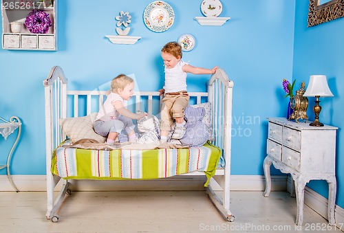 Image of Children on the bed