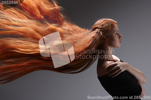 Image of Beautiful woman with red hair