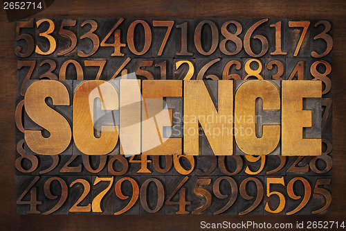 Image of science word and numbers in wood type