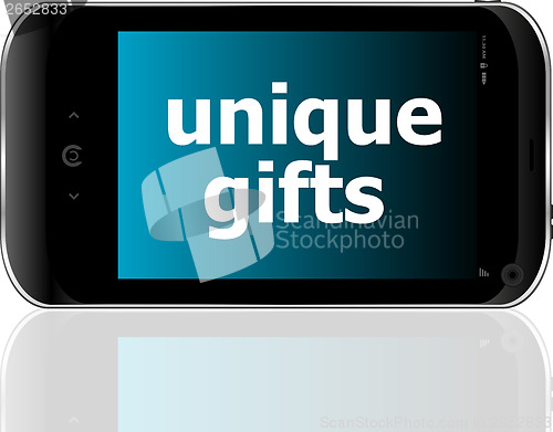 Image of digital smartphone with unique gifts words, holiday concept