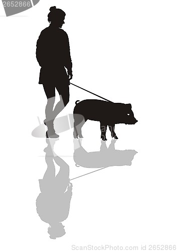 Image of Woman with a pig on a leash