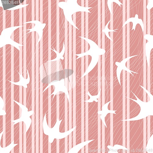Image of swallow on  striped pink background