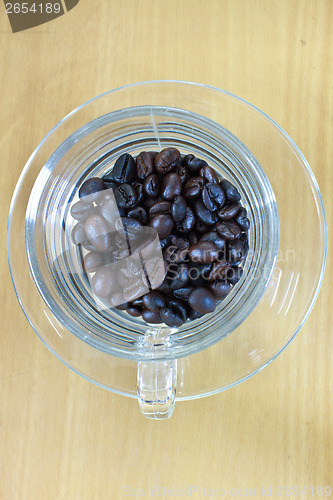 Image of coffee beans in cup 