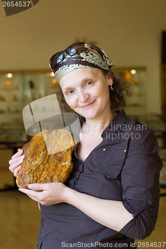 Image of Woman with amber