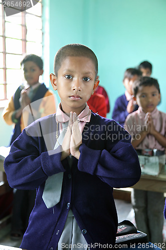 Image of Portrait of schoolboy at school, Kumrokhali, West Bengal, India