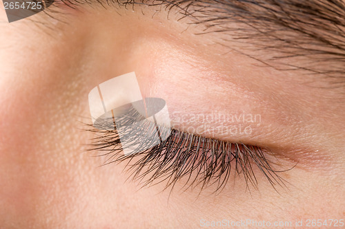 Image of teenager man eye macro