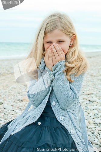 Image of pretty girl at the autumn beach 