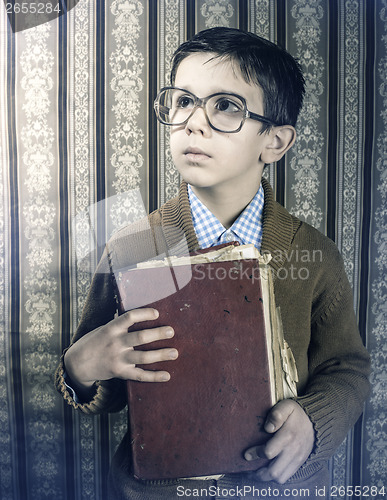 Image of Child with red vintage book
