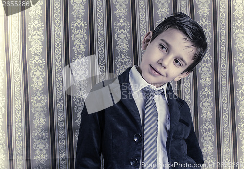 Image of Boy in vintage suit