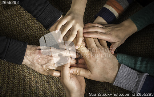 Image of Many hands together