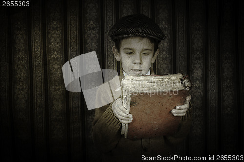 Image of Child with red vintage book