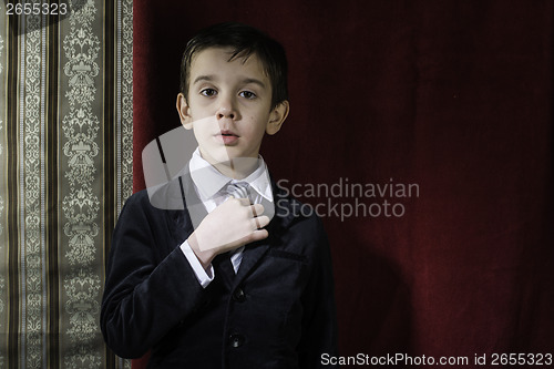 Image of Boy in vintage suit