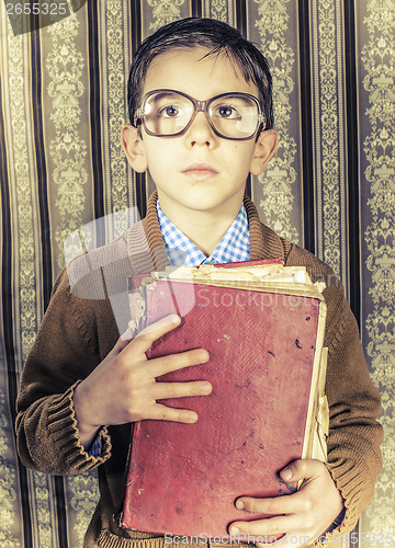 Image of Child with red vintage book