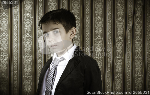 Image of Boy in vintage suit