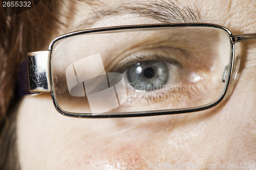 Image of Close up old women eye and glasses