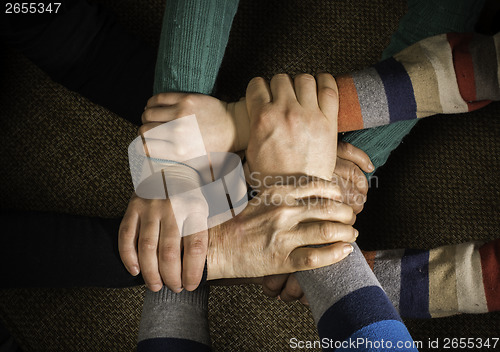 Image of Many hands together
