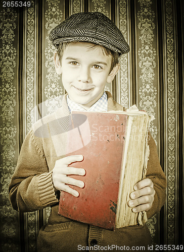 Image of Child with red vintage book